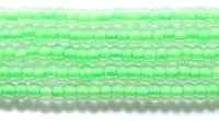 10SB784-NR: CZ Seed Bead Neon Lined Green 10/0 Uv Reactive - 1HK