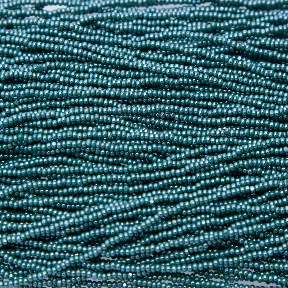 11SB386-CR: CZ Seed Bead True Cut Sfinx DK Green 11/0 1HK