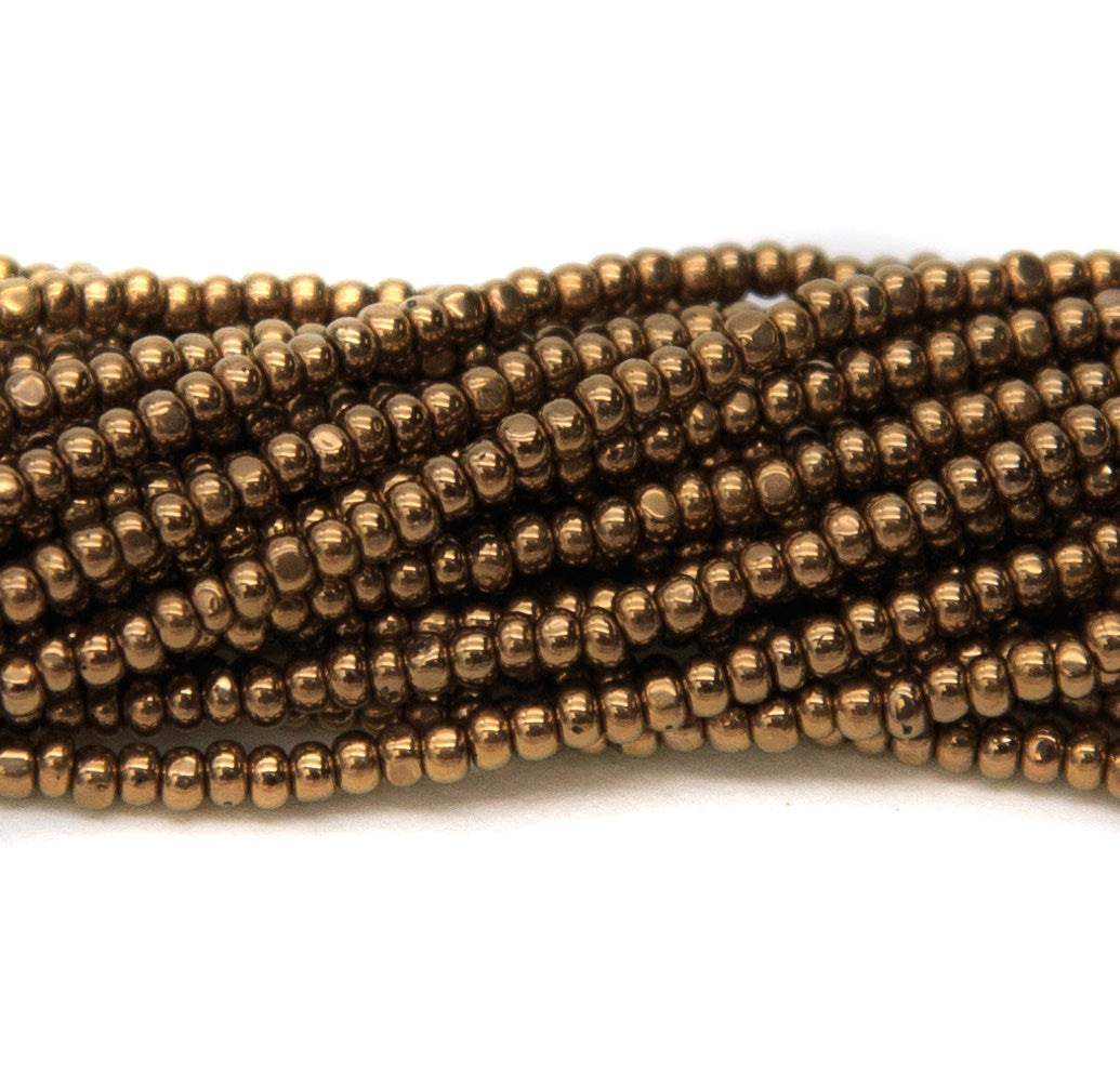 11SB555-CR: CZ True Seed Bead Bronze 11/0-1HK