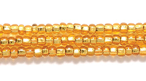 11SB454-7: CZ Seed Bead Silver Lined MED Gold 11/0 6HK