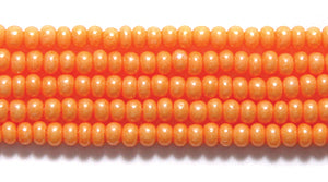 11SB134-TA: CZ Seed Bead Terra Op Orange 11/0 6HK