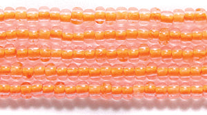 10SB734-N: CZ Seed Bead Neon Lined Orange 10/0 Uv Reactive 5HK