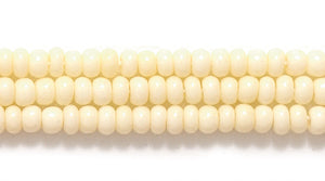 10SB150: CZ Seed Bead OP Bone Effect 10/0 5HK