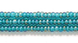 10SB587-T: CZ Seed Bead TR Emerald AB 10/0 5HK