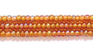 11SB556-T: CZ Seed Bead TR DK Topaz AB 11/0 6HK