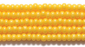 10SB126-TA: CZ Seed Bead Terra DK Yellow 10/0 5HK