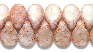 57DP110-93: CZ Pips Pink Piccaso On Alabaster 5x7mm 600PC