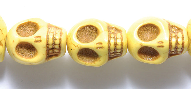 ST50-Y: Skulls Magnesite Yellow 13x18mm