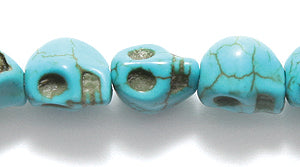 4ST50-B: Magnesite Skull Turquoise Blue 6x8mm