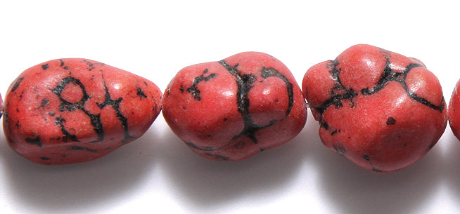 ST5605-394: Salmon Red Magnesite Nugget 18-25 STR