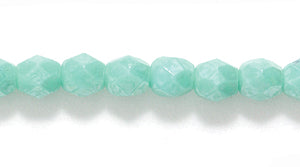 4FC385: CZ FACET RD Opaque Turquoise Green Luster 4MM-600PC