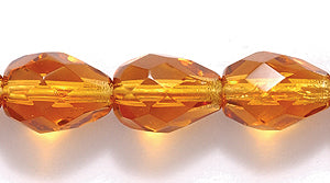 44FC254-2JR: CZ Faceted Drop Trans DKer Topaz 7x9mm-25PC