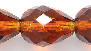 46FC256-1R: CZ Faceted Drop Trans MED DK Topaz 7x10mm-25PC