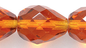 46FC254-2R: CZ Faceted Drop Trans DK Topaz 7x10mm-25PC