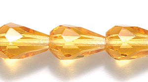 48FC254-5R: CZ Faceted Drop Trans LT Topaz 7x10mm-25PC