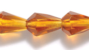 48FC254-2R: CZ Faceted Drop Trans DK Topaz 7x10mm-25PC