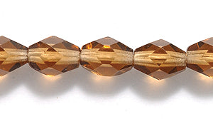 34FC257-3R: CZ Faceted Oval Trans LT MED Smoke Topaz 5x7mm-50PC