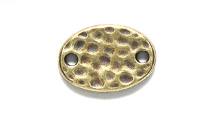 TC3081-AB: Link Hammered Oval 9x12.8mm Ant Brass