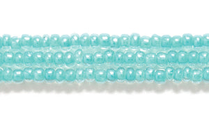 11SB3787R: CZ Seed Bead Coated Lined Green Teal Sfinx 11/0-1HK