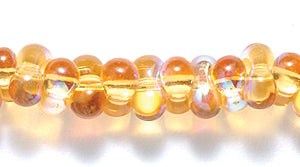 91SB554-LTR: CZ Seed Bead Farfalle Trans Topaz AB 3x7mm-1STR