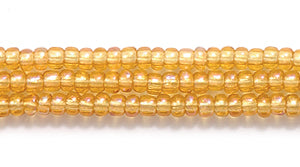 11SB554-TR: CZ Seed Bead Trans Topaz AB 11/0-1HK