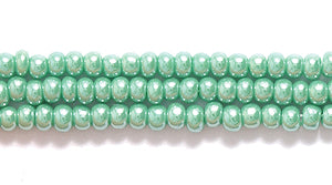 11SB384R: CZ Seed Bead Sfinx Green 11/0-1HK