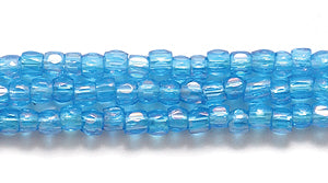 9SC566-TR: CZ Seed Bead 3-cut Trans DK Aqua Blue AB 9/0-1HK