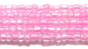 9SC791-LSR: CZ Seed Bead 3-cut Color Lined Pink Luster 9/0-1HK