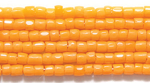 9SC132R: CZ Seed Bead 3-cut Opaque LT Orange 9/0-1HK