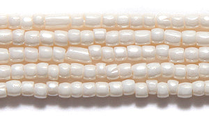 9SC651R: CZ Seed Bead 3-cut Pearl LT Egg Shell 9/0-1HK