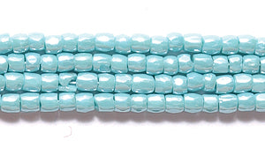 9SC385R: CZ Seed Bead 3-cut Luster Turquoise Green 9/0-1HK