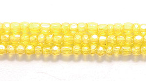 9SC322-TR: CZ Seed Bead 3-cut Trans Luster LT Yellow 9/0-1HK