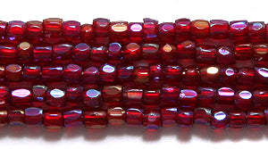 9SC546-TR: CZ Seed Bead 3-cut Trans Garnet AB 9/0-1HK