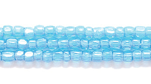 9SC366-TR: CZ Seed Bead 3-cut Trans DK Aqua Luster 9/0-1HK