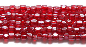 9SC342-TR: CZ Seed Bead 3-cut Trans Luster LT Ruby 9/0-1HK