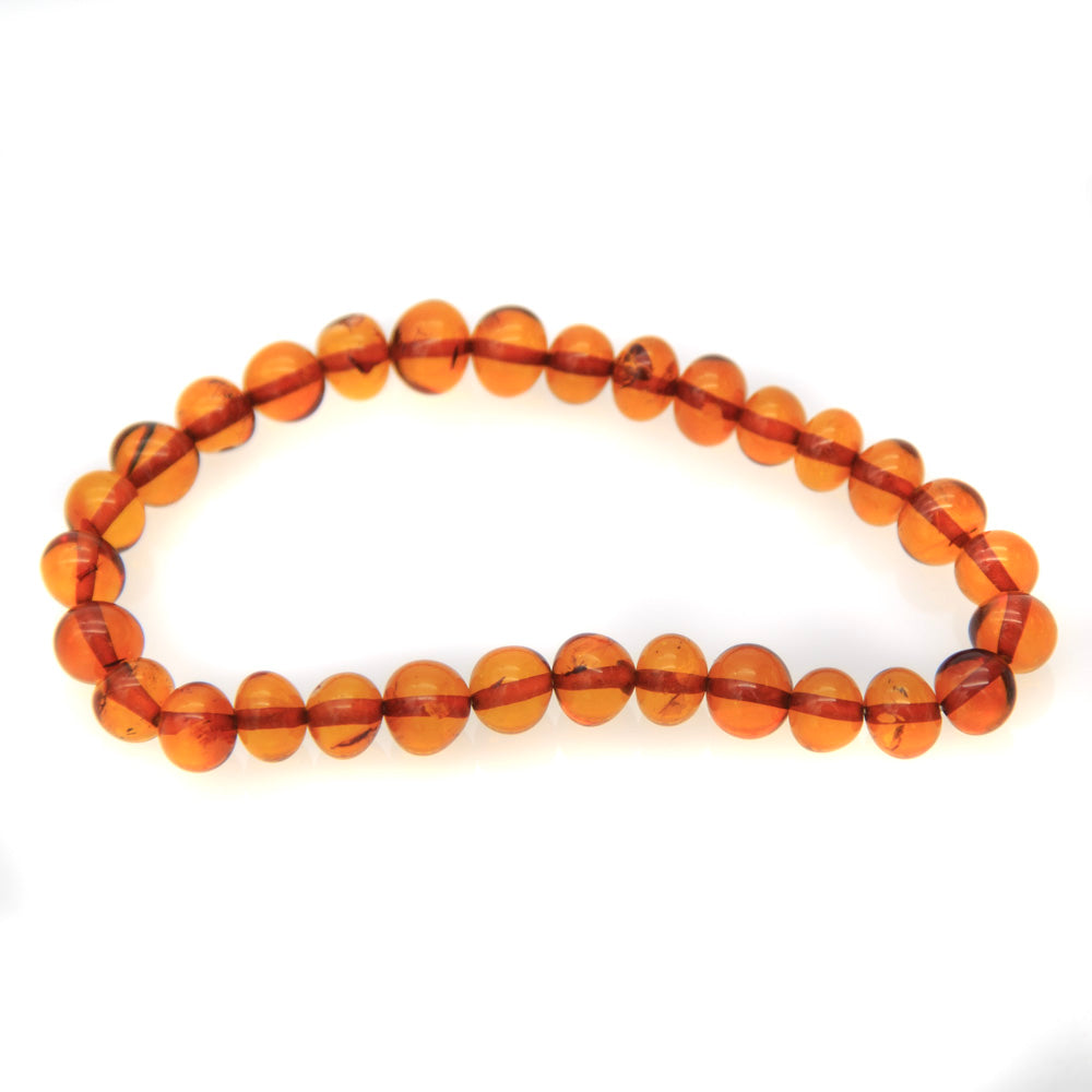 1AC925-B1: Amber Stretch Bracelet Round Nuggets Honey