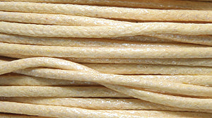 10CH651-25: Waxed Cord Pearl Light Tan 1mm 25MTR SP