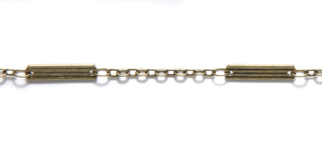 CX926-AB: Chain 9mm Texture Bar 2mm LNK ANT Brass 1FT