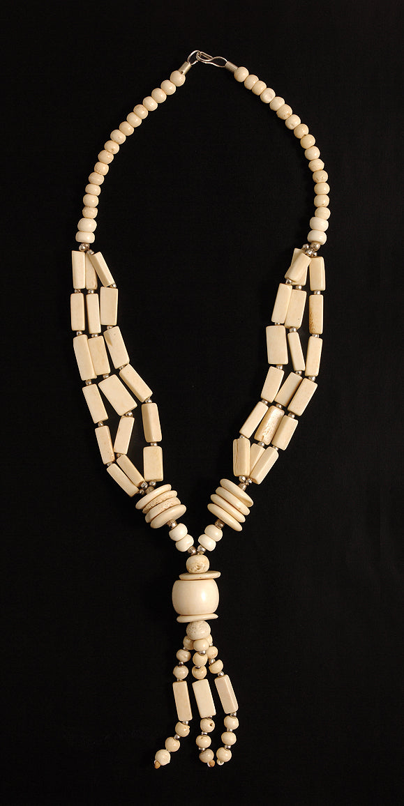 IN118-3: Bone Necklace Natural With Tassel 19"