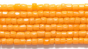 9SC132: CZ Seed Bead 3-cut Opaque LT Orange 9/0 10HK