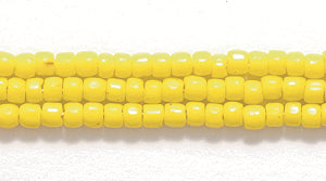 9SC122: CZ Seed Bead 3-cut Opaque LT Yellow 9/0 5HK