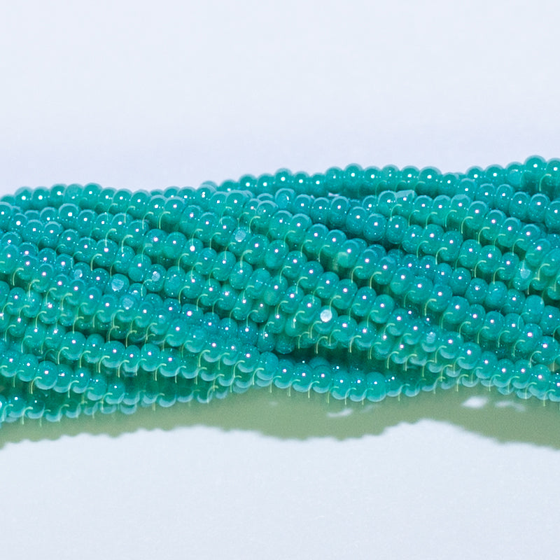 13SB385-CR: CZ Seed Bead Charlotte Sfinx turquoise Green AB 13/0-1HK ...