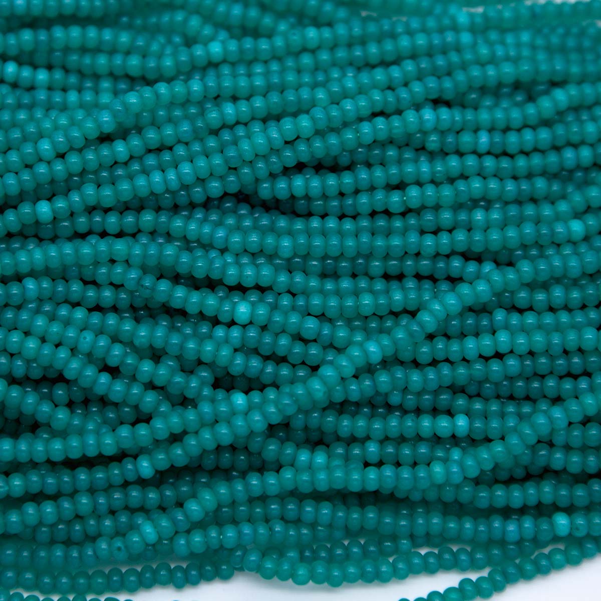 6SB982: CZ Seed Bead Dyed Alabaster Green  #17858 6/0 36STR