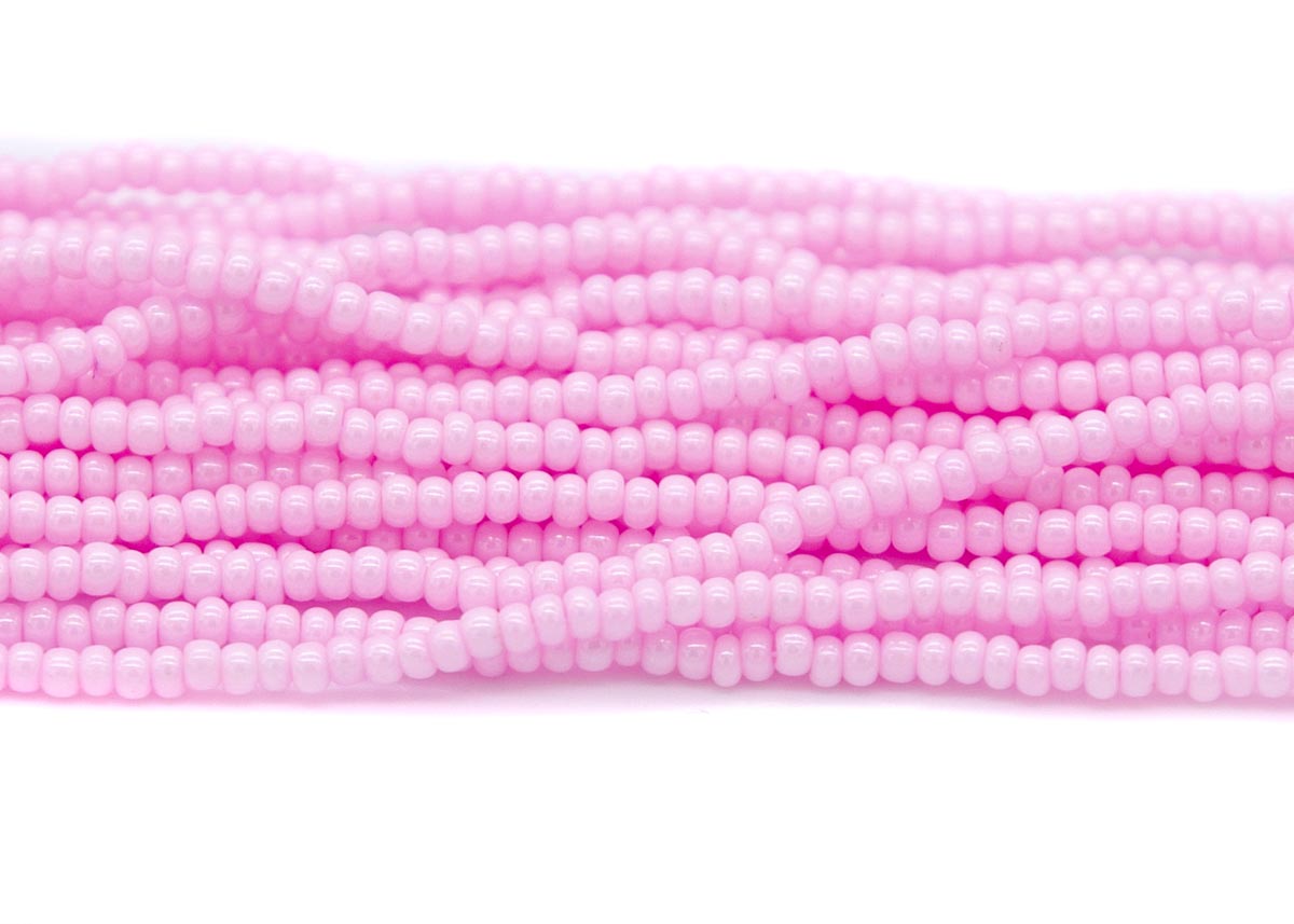 10SB191-DY: CZ Seed Bead Coated LT Pink on White 10/0 6HK