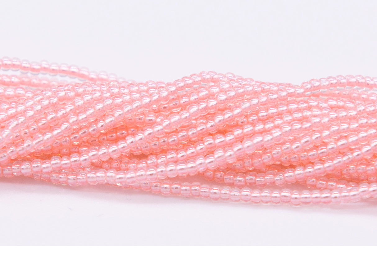 10SB691-LPR: CZ Seed Bead Pastel Pearl Lined Pink 10/0-1HK