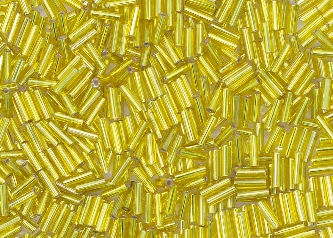 3BB422-50: CZ Bugle Bead SIL Line Yellow Round Hole #3-50GM