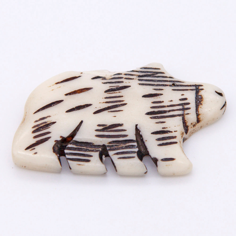 BN385-79: Bone Bear Pendant Carved White/Black 45x26mm - 5 Pieces