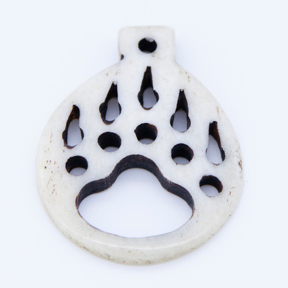 BN385-64: Bone Bear Paw Print PNDT Carve Wht/Blk 35x45 5PPK