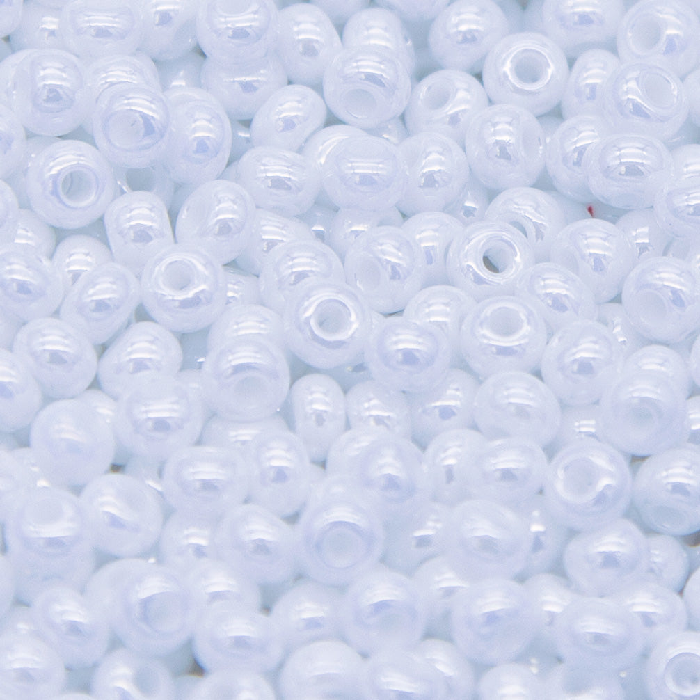 5SB312-L: CZ Seed Bead Sfinx White 5/0 100GM