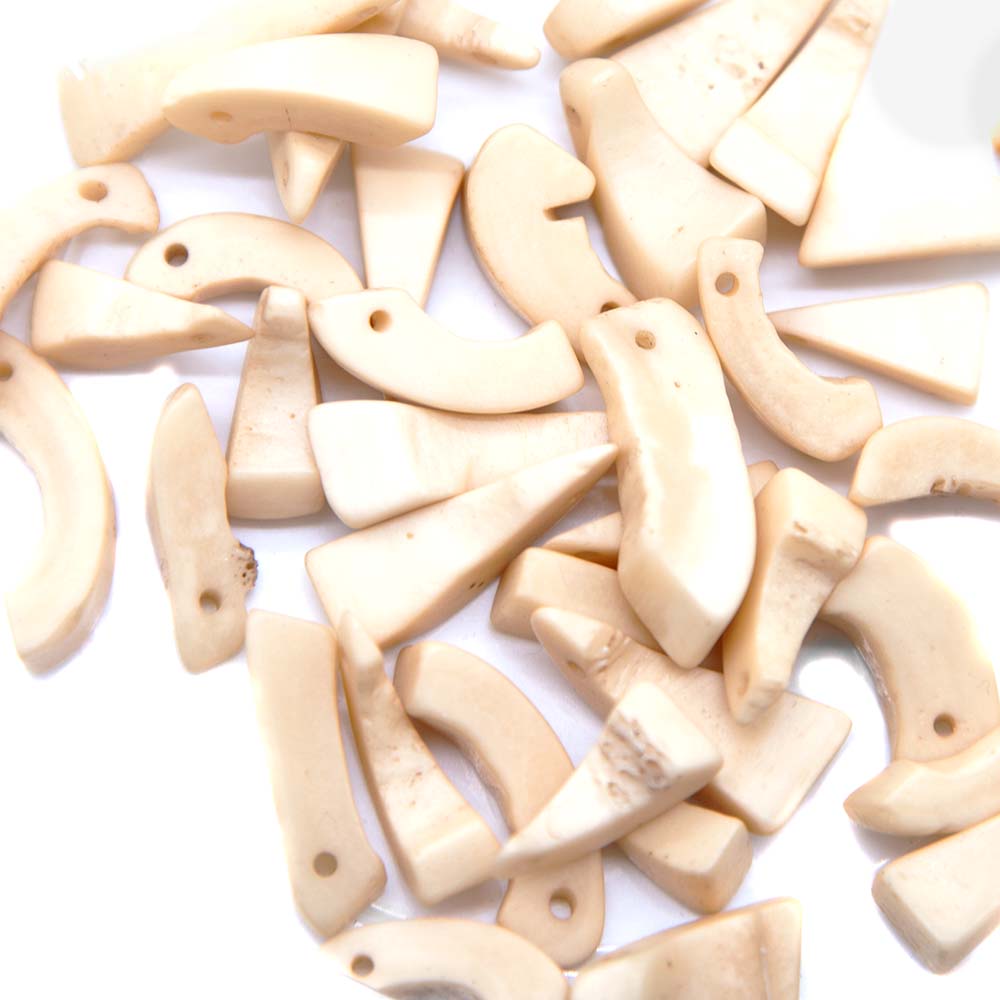 BN375-79R: Bone Curved Drop Mix Antique .5-1 Inch -50GM